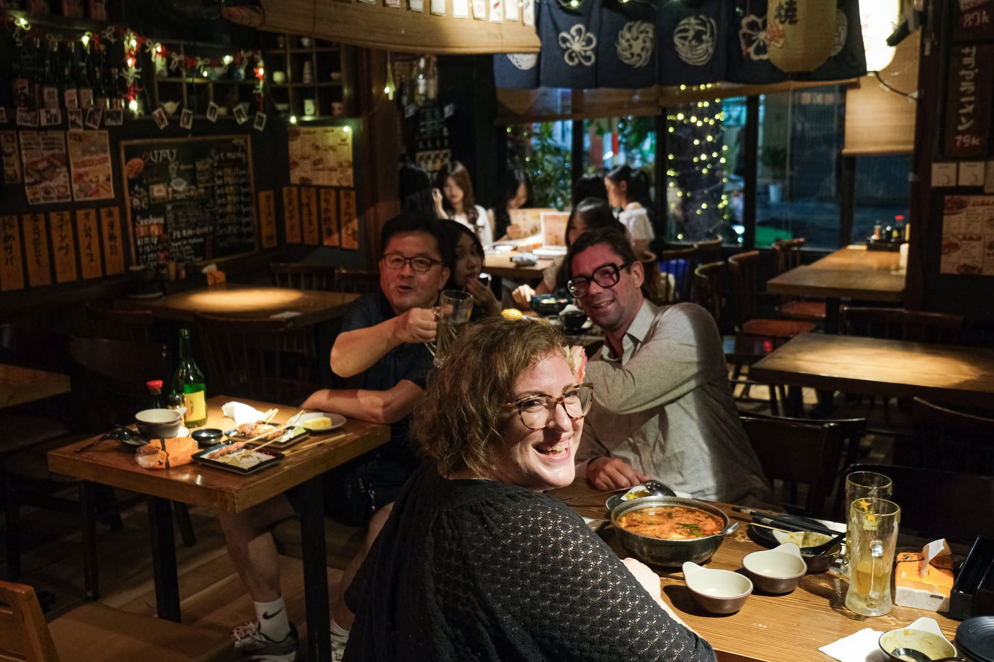 Red paper lantern above the izakaya dining room